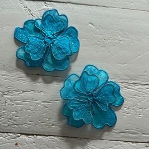 2 3D organza flower appliques, likely intended for sewing or ironing onto fabric
